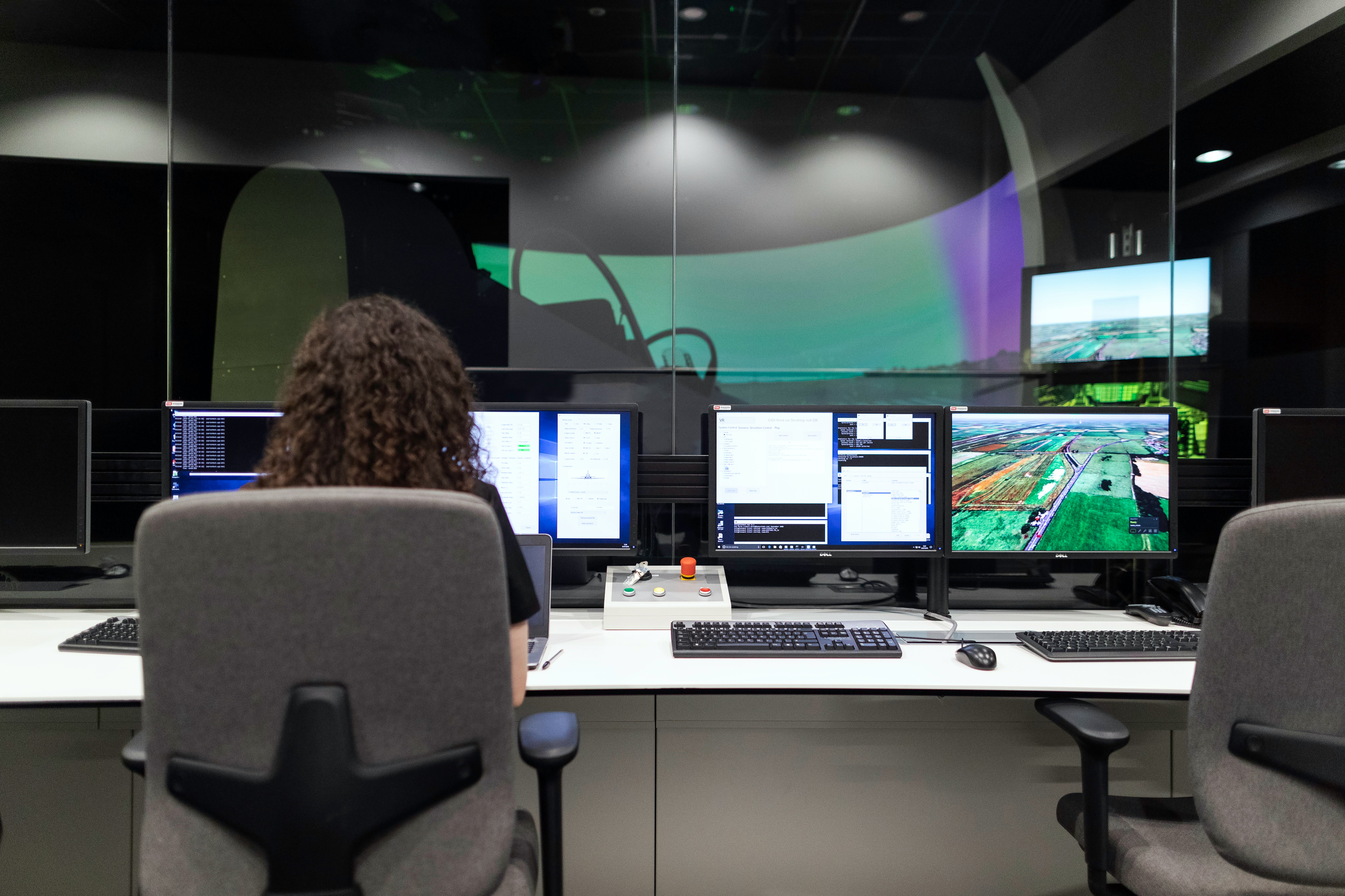 Software engineers collaborating in a high-tech environment.